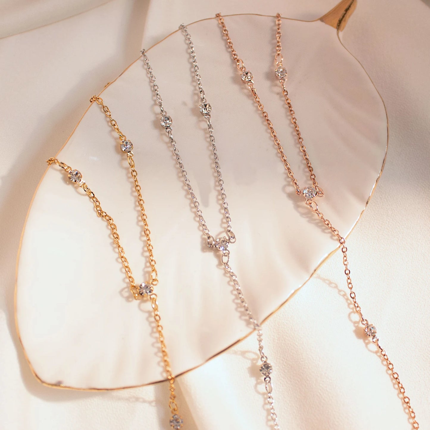 Cubic Foot Anklet With White Topaz Stone