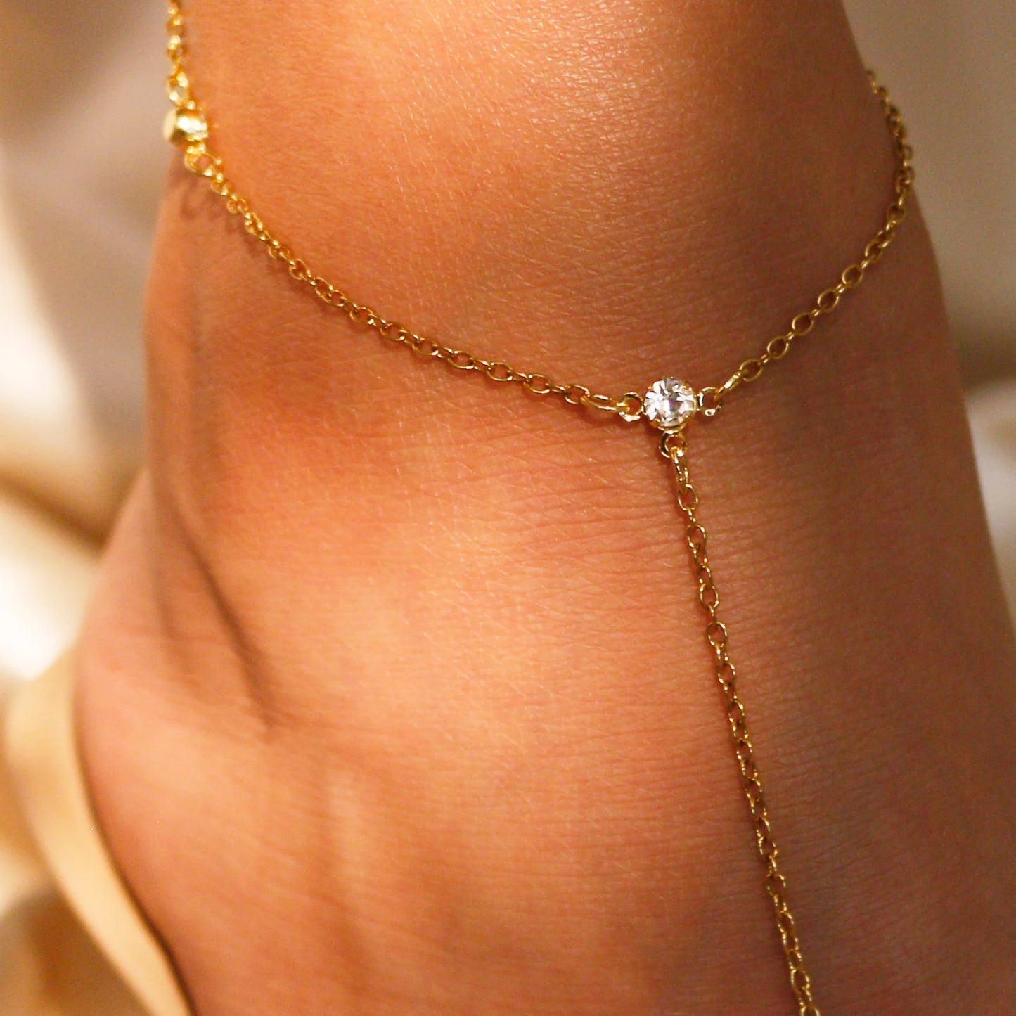 Cubic Foot Anklet With White Topaz Stone