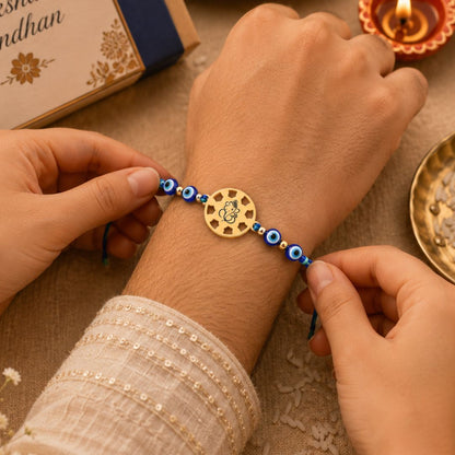 Ganesha Rakhi With Evil Eye Pearl